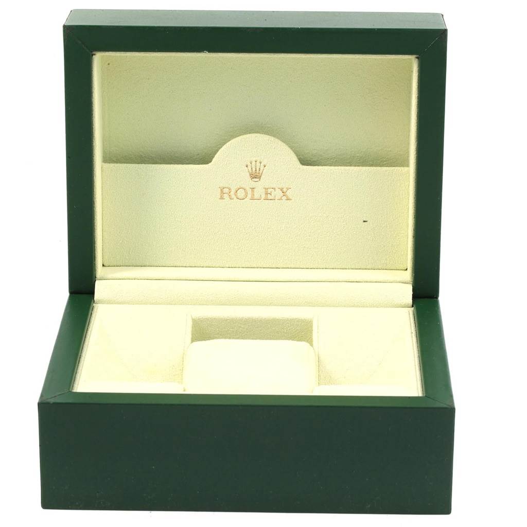 The image shows an open, empty green Rolex Datejust 179173 Women's Steel and Gold (two tone) Silver Dial 179173 Women's Steel and Gold (two tone) Silver Dial watch box in an upright position.