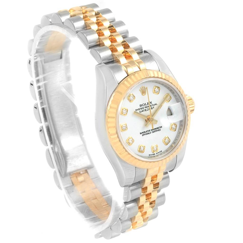 The image shows a Rolex Datejust 179173 Women's Steel and Gold (two tone) Silver Dial 179173 Women's Steel and Gold (two tone) Silver Dial watch from an angled side view, highlighting the dial, bezel, and two-tone bracelet.