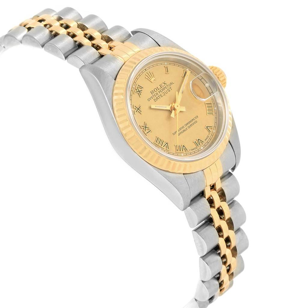 The image shows a side view and partial top view of a Rolex Datejust 69173 Women's Stainless Steel Champagne Dial 69173 Women's Stainless Steel Champagne Dial watch, highlighting the gold and silver bracelet and gold dial.