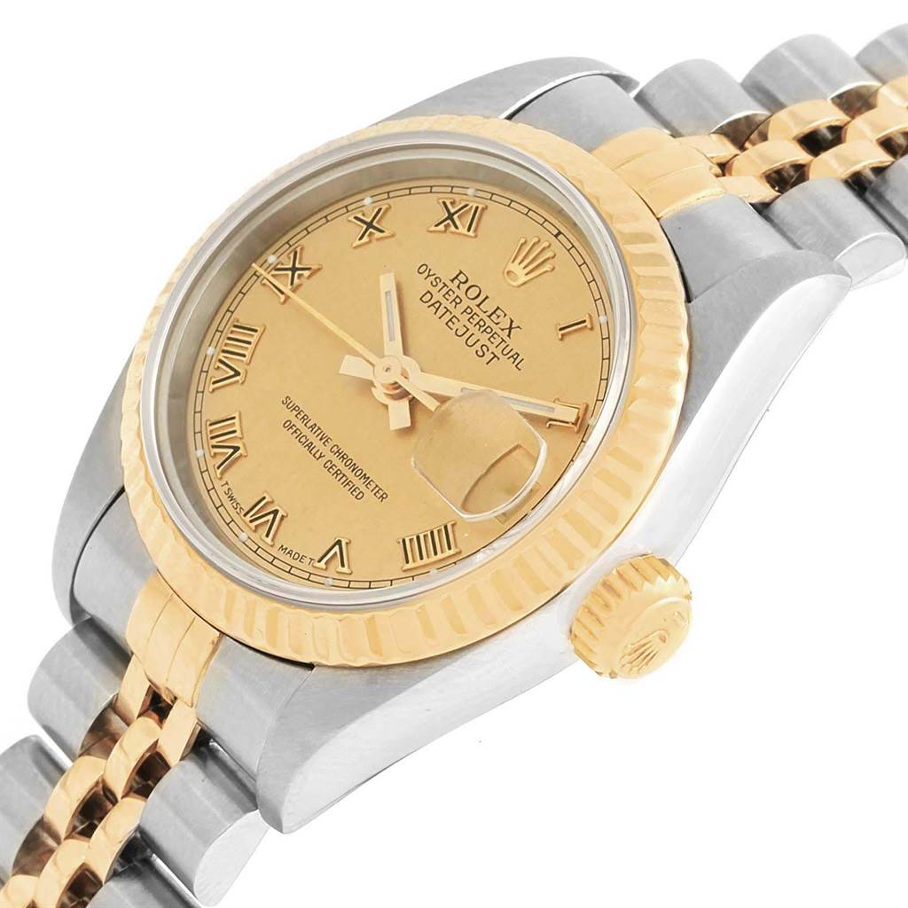 The image shows a close-up angle of a Rolex Datejust 69173 Women's Stainless Steel Champagne Dial 69173 Women's Stainless Steel Champagne Dial watch, highlighting the gold dial, fluted bezel, and two-tone bracelet.
