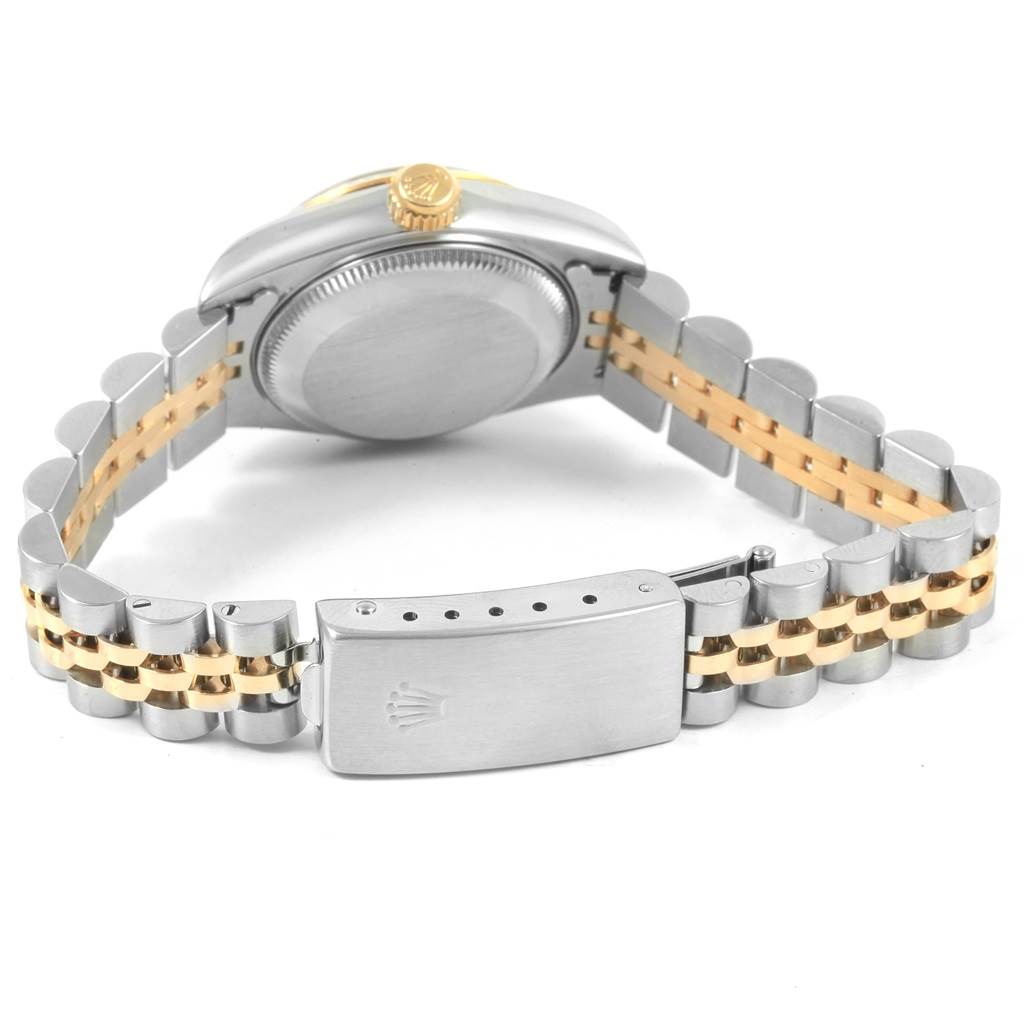 The image shows the back view of a Rolex Datejust 69173 Women's Stainless Steel Blue Dial 69173 Women's Stainless Steel Blue Dial watch, highlighting the case back, crown, and Jubilee bracelet with a clasp.