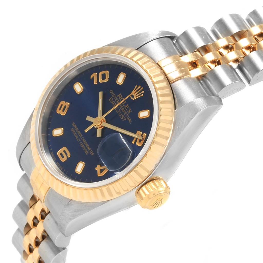 This image shows a side view of a Rolex Datejust 69173 Women's Stainless Steel Blue Dial 69173 Women's Stainless Steel Blue Dial, highlighting the bezel, dial, crown, and part of the bracelet.