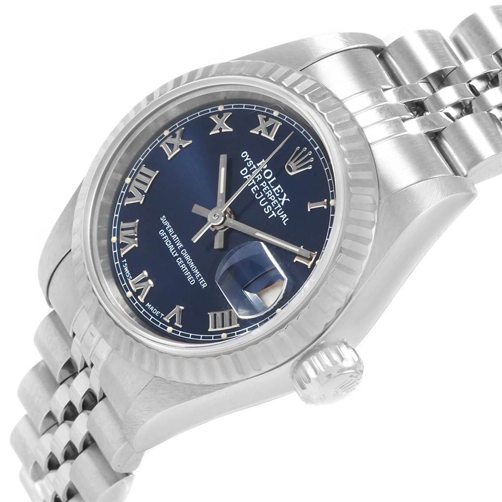 The image shows a close-up of a Rolex Datejust 69174 Women's Stainless Steel Blue Dial 69174 Women's Stainless Steel Blue Dial watch at an angled view, highlighting the dial, bezel, crown, and part of the bracelet.