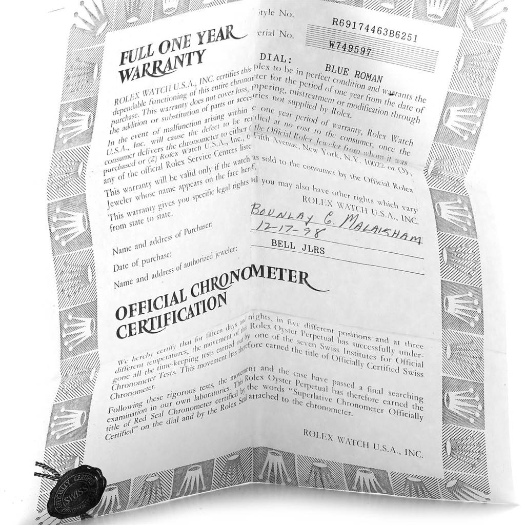 The image shows the warranty and official chronometer certification for a Rolex Datejust 69174 Women's Stainless Steel Blue Dial 69174 Women's Stainless Steel Blue Dial watch.