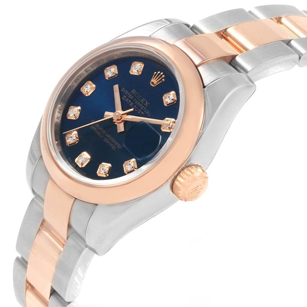 The Rolex Datejust 179161 Women's Steel and Gold (two tone) Blue Dial 179161 Women's Steel and Gold (two tone) Blue Dial watch is shown from a tilted angle, displaying its dial, bezel, crown, and part of the bracelet.