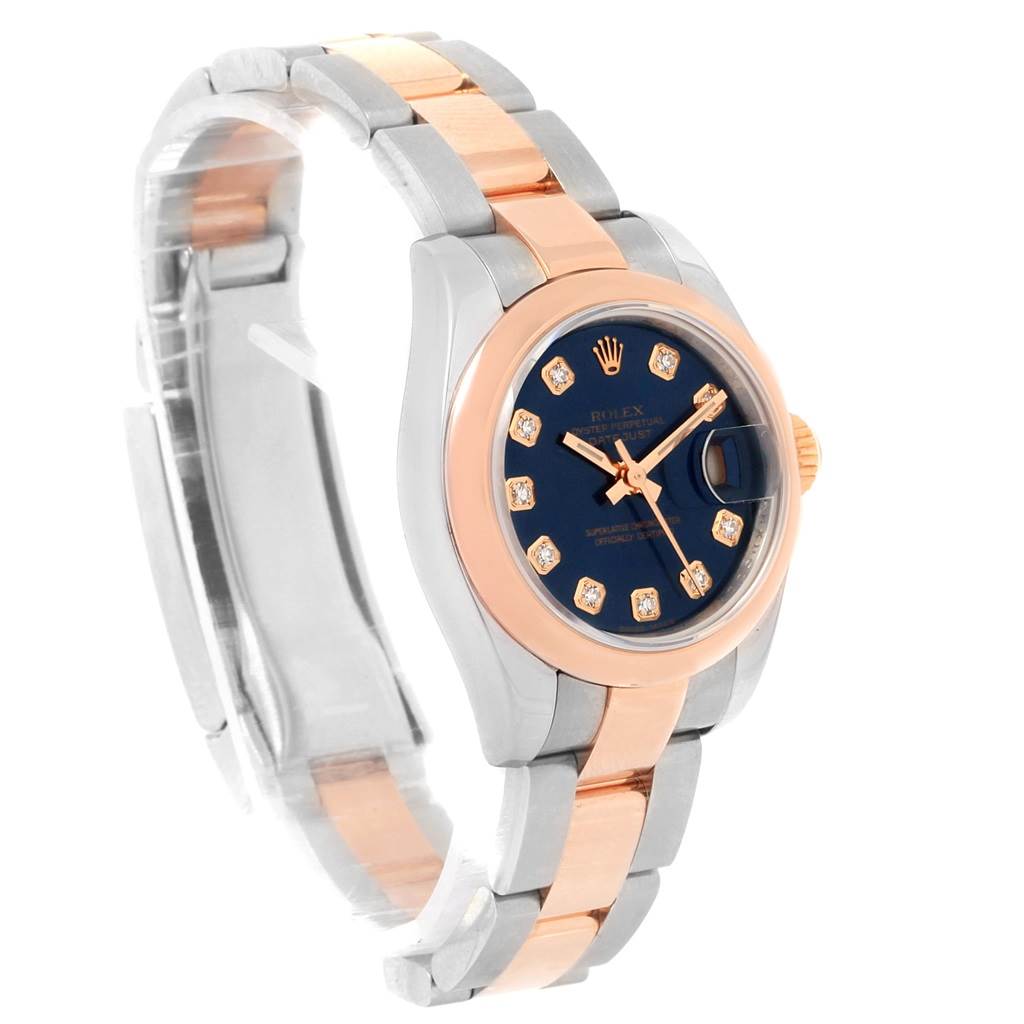 The Rolex Datejust 179161 Women's Steel and Gold (two tone) Blue Dial 179161 Women's Steel and Gold (two tone) Blue Dial watch is shown at a three-quarter angle highlighting its bi-metal bracelet, blue dial, and diamond hour markers.