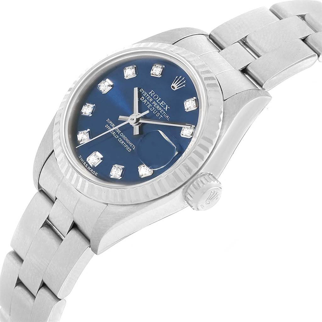 This image shows a Rolex Datejust 79174 Women
s Stainless Steel Blue Dial 79174 Women
s Stainless Steel Blue Dial watch at a slight angle, highlighting its face, crown, and part of the bracelet.