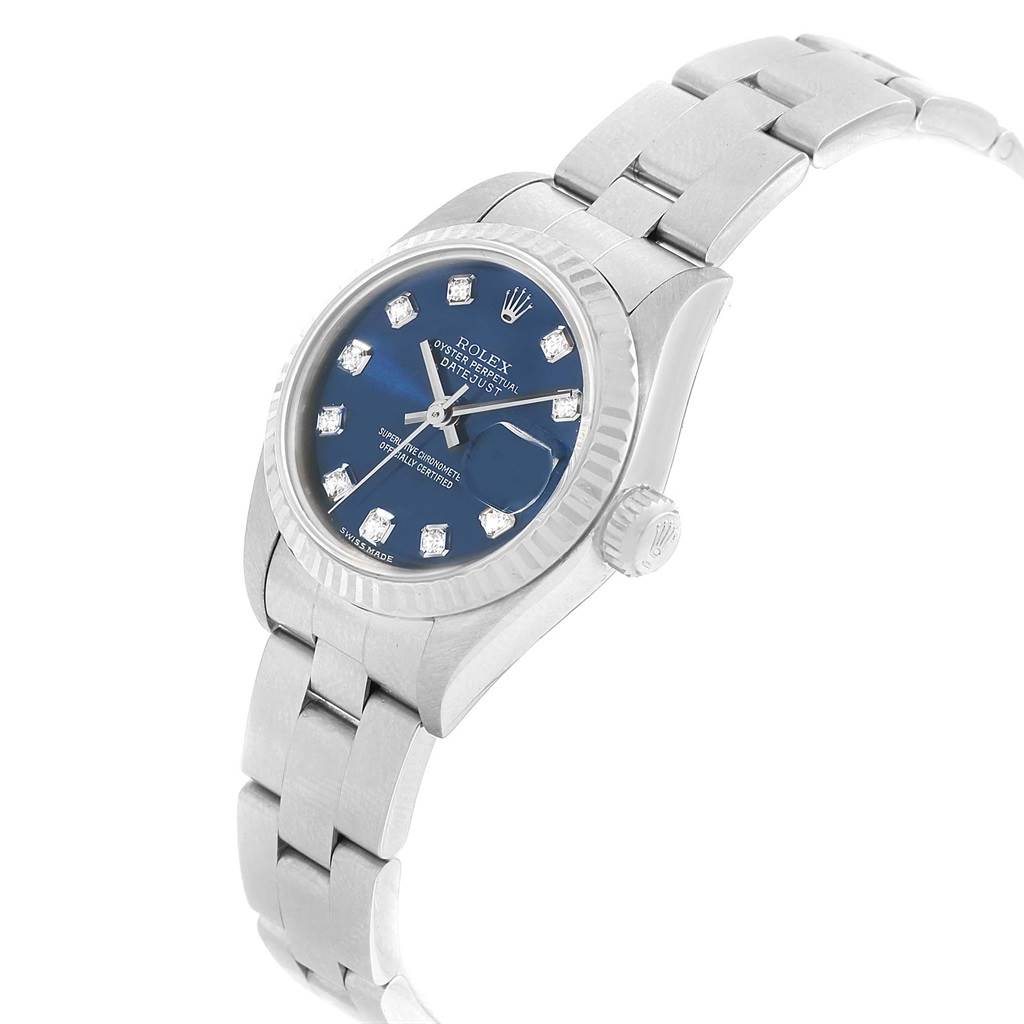 The Rolex Datejust 79174 Women
s Stainless Steel Blue Dial 79174 Women
s Stainless Steel Blue Dial watch is shown at a slight angle, highlighting the dial, case, bracelet, and crown.