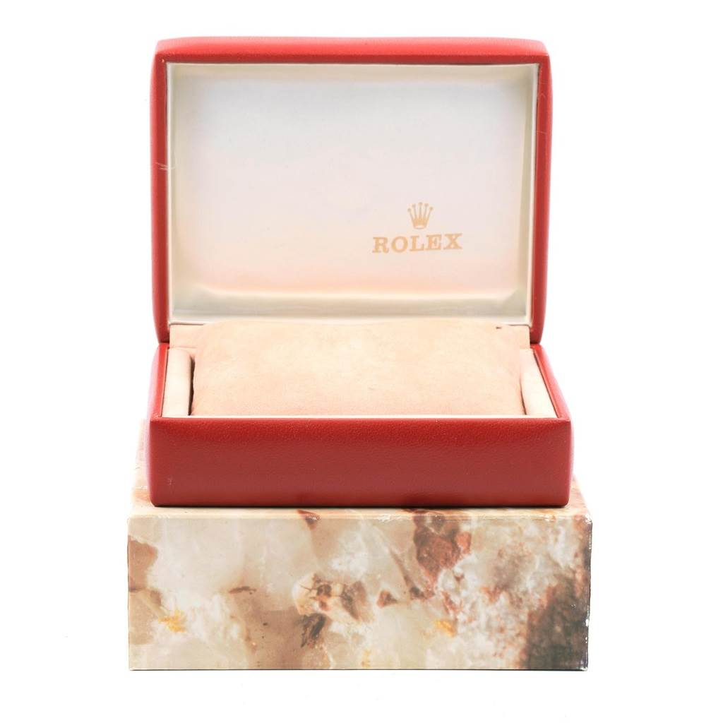 The image displays an open Rolex Datejust 69173 Women's Stainless Steel Champagne Dial 69173 Women's Stainless Steel Champagne Dial watch box from a front angle, with the logo visible on the inside lid.