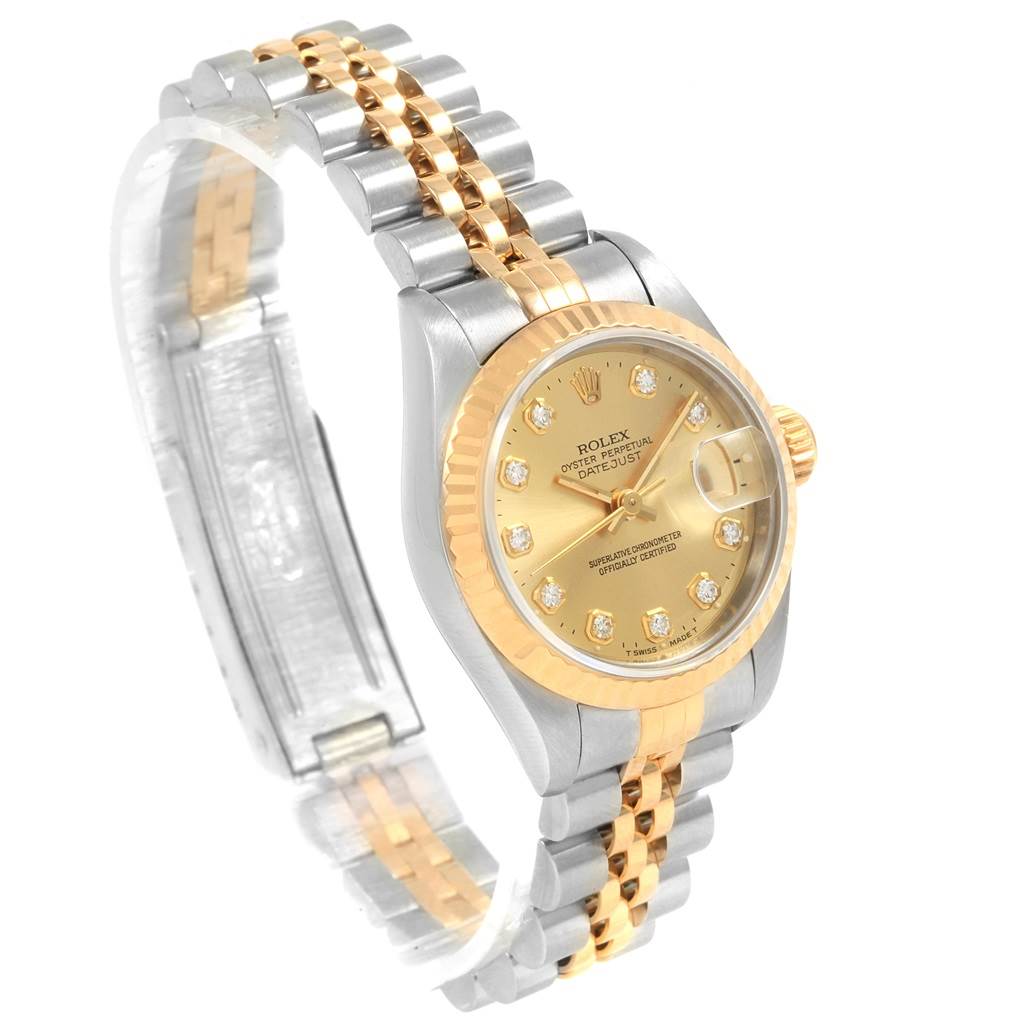The Rolex Datejust 69173 Women
s Stainless Steel Champagne Dial 69173 Women
s Stainless Steel Champagne Dial watch is shown at an angled view, displaying the face, bracelet, and fluted bezel.