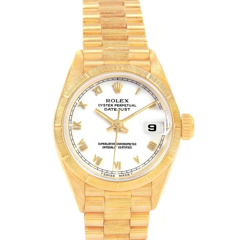 This image shows a front view of a Rolex Datejust 69278 Women's Yellow Gold White Dial 69278 Women's Yellow Gold White Dial watch, highlighting its gold case, bracelet, and white dial with a date window.