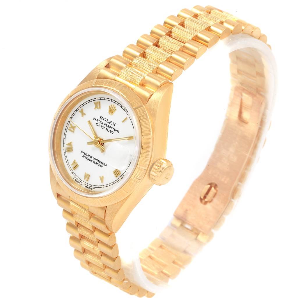 This Rolex Datejust 69278 Women's Yellow Gold White Dial 69278 Women's Yellow Gold White Dial watch is shown at a slight angle, displaying its gold bracelet, case, crown, and white dial.
