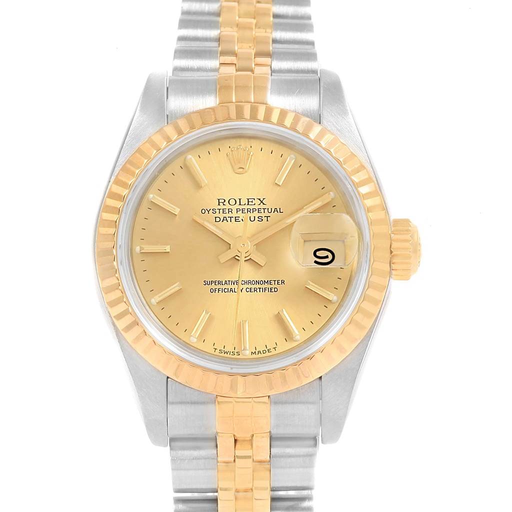The image shows a front view of the Rolex Datejust 69173 Women's Stainless Steel Champagne Dial 69173 Women's Stainless Steel Champagne Dial watch with a gold dial, fluted bezel, and two-tone jubilee bracelet.
