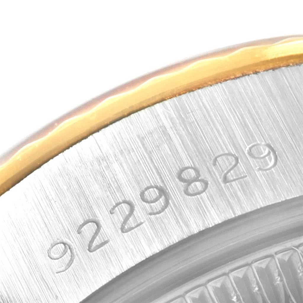 This close-up image shows the engraved serial number on the side of a Rolex Datejust 69173 Women's Stainless Steel Grey Dial 69173 Women's Stainless Steel Grey Dial model.