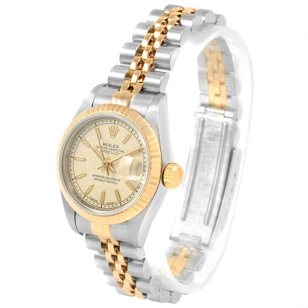 The Rolex Datejust 69173 Women's Stainless Steel Beige Dial 69173 Women's Stainless Steel Beige Dial watch is shown at a slight angle, displaying the face, bezel, crown, and part of the bracelet.