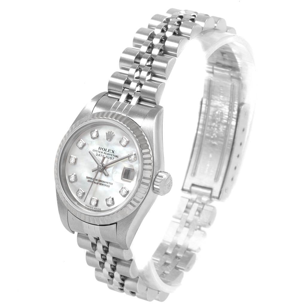 The image shows a Rolex Datejust 79174 Women
s Stainless Steel Mother of Pearl Dial 79174 Women
s Stainless Steel Mother of Pearl Dial watch at a tilted angle, highlighting its face, bezel, crown, and part of its metallic bracelet.