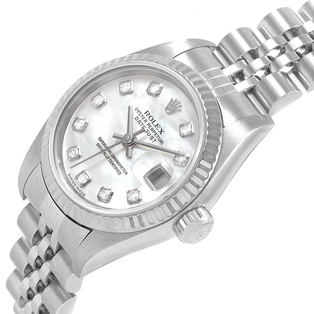 The image shows a close-up angle of the Rolex Datejust 79174 Women
s Stainless Steel Mother of Pearl Dial 79174 Women
s Stainless Steel Mother of Pearl Dial watch
s face, crown, and part of the bracelet.