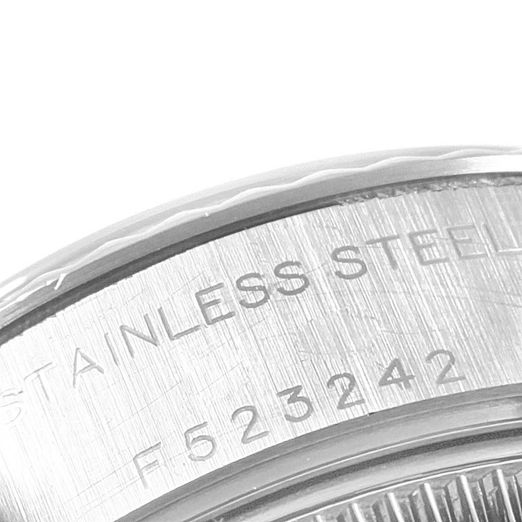 This close-up image shows the stainless steel case back and serial number of the Rolex Datejust 79174 Women
s Stainless Steel Mother of Pearl Dial 79174 Women
s Stainless Steel Mother of Pearl Dial watch.