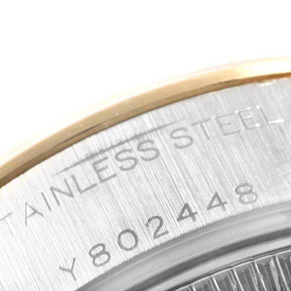 This close-up image shows the case back of the Rolex Datejust 79163 Women's Steel and Gold (two tone) White Dial 79163 Women's Steel and Gold (two tone) White Dial, highlighting the stainless steel material and part of the serial number.
