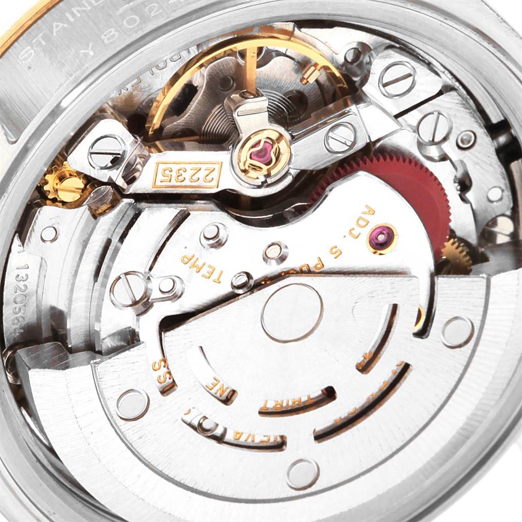 The image shows the intricate internal mechanism of the Rolex Datejust 79163 Women's Steel and Gold (two tone) White Dial 79163 Women's Steel and Gold (two tone) White Dial watch, viewed up close.