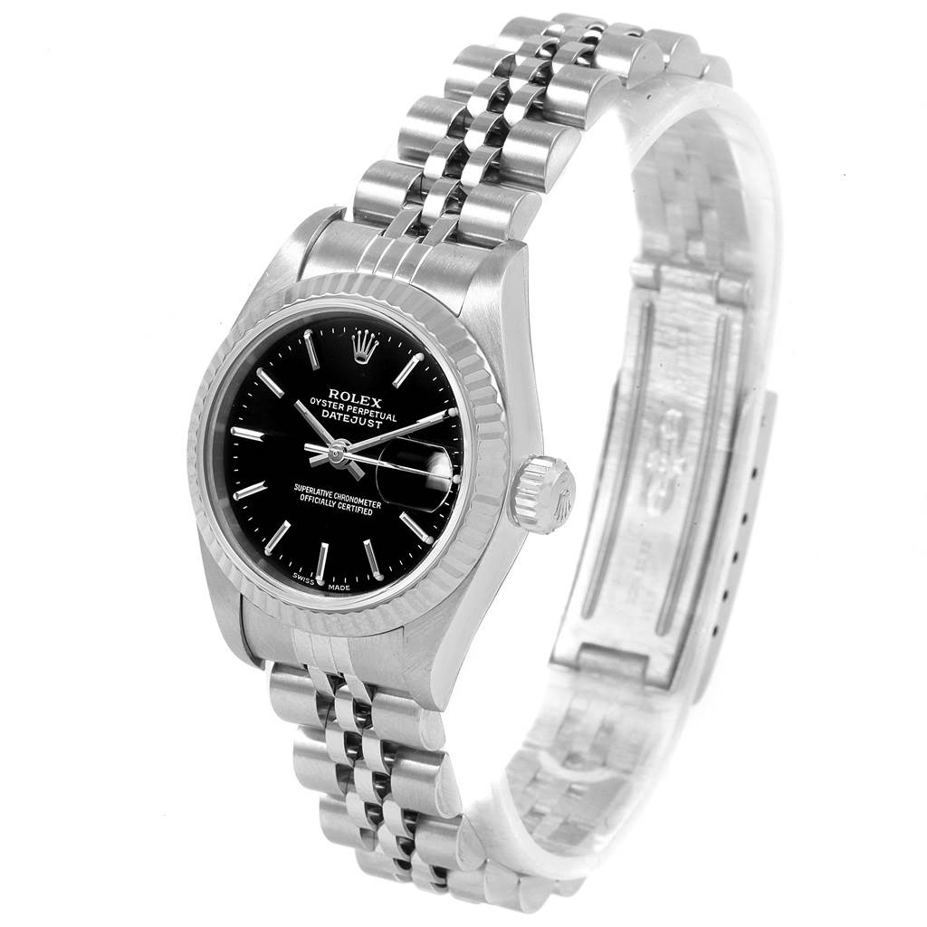 The image shows a Rolex Datejust 79174 Women
s Stainless Steel Black Dial 79174 Women
s Stainless Steel Black Dial watch at a three-quarter angle, displaying the face, crown, and jubilee bracelet.