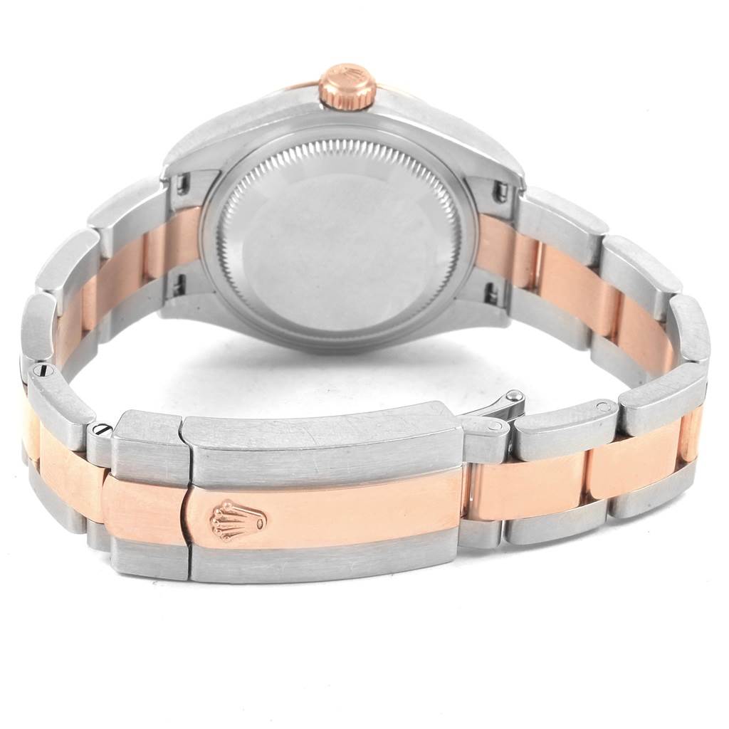 The image shows the back of a Rolex Datejust 279171 Women's Steel and Gold (two tone) Green Dial 279171 Women's Steel and Gold (two tone) Green Dial watch, focusing on the case back and bi-color metal bracelet with a clasp.