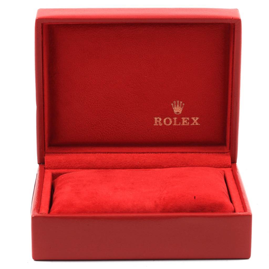 This is an open red watch box for a Rolex Datejust 69174 Women
s Stainless Steel Silver Dial 69174 Women
s Stainless Steel Silver Dial model, showing the interior cushion and brand logo.