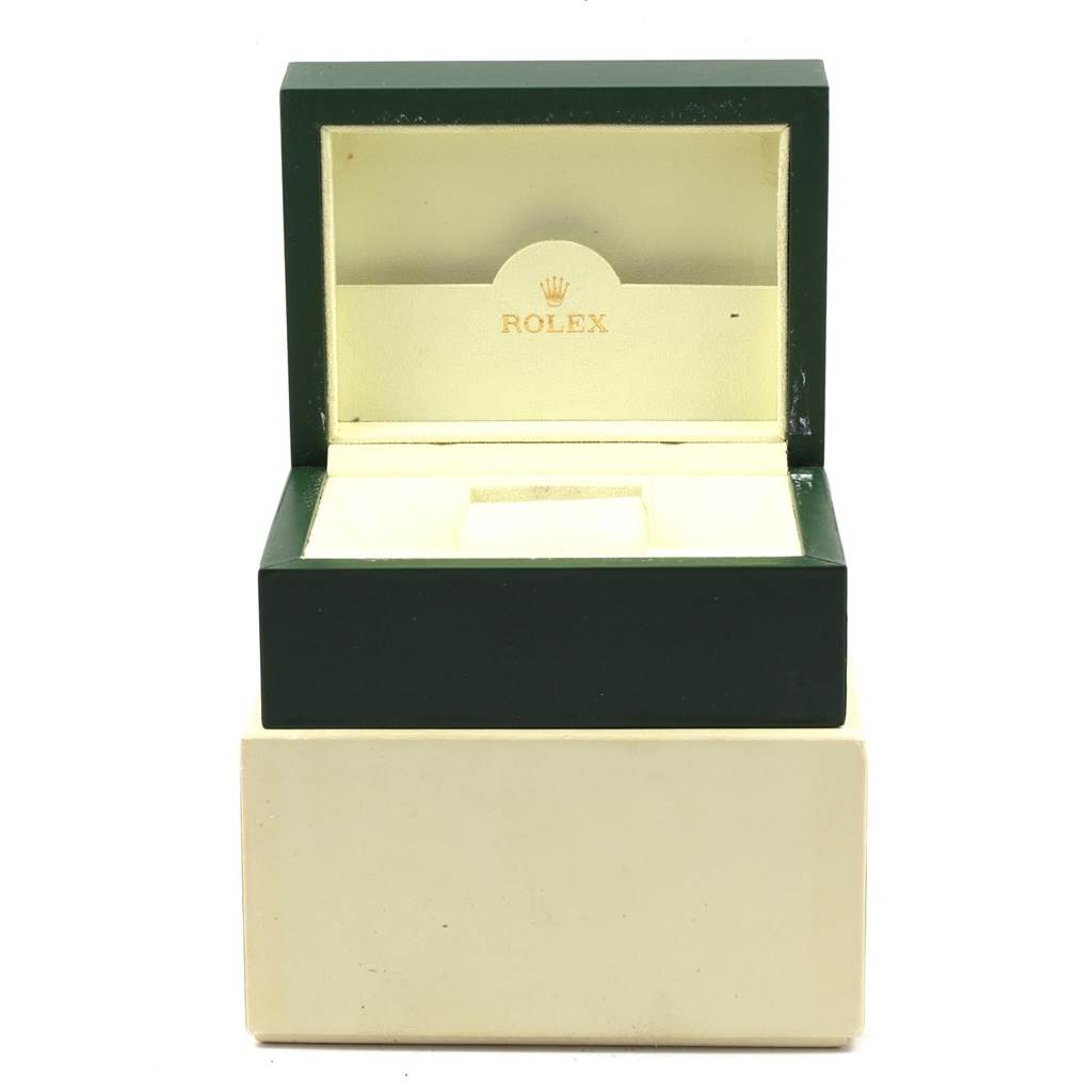 This image shows an open Rolex Datejust 179174 Women
s Stainless Steel Mother of Pearl Dial 179174 Women
s Stainless Steel Mother of Pearl Dial watch box from a front angle, revealing its interior.