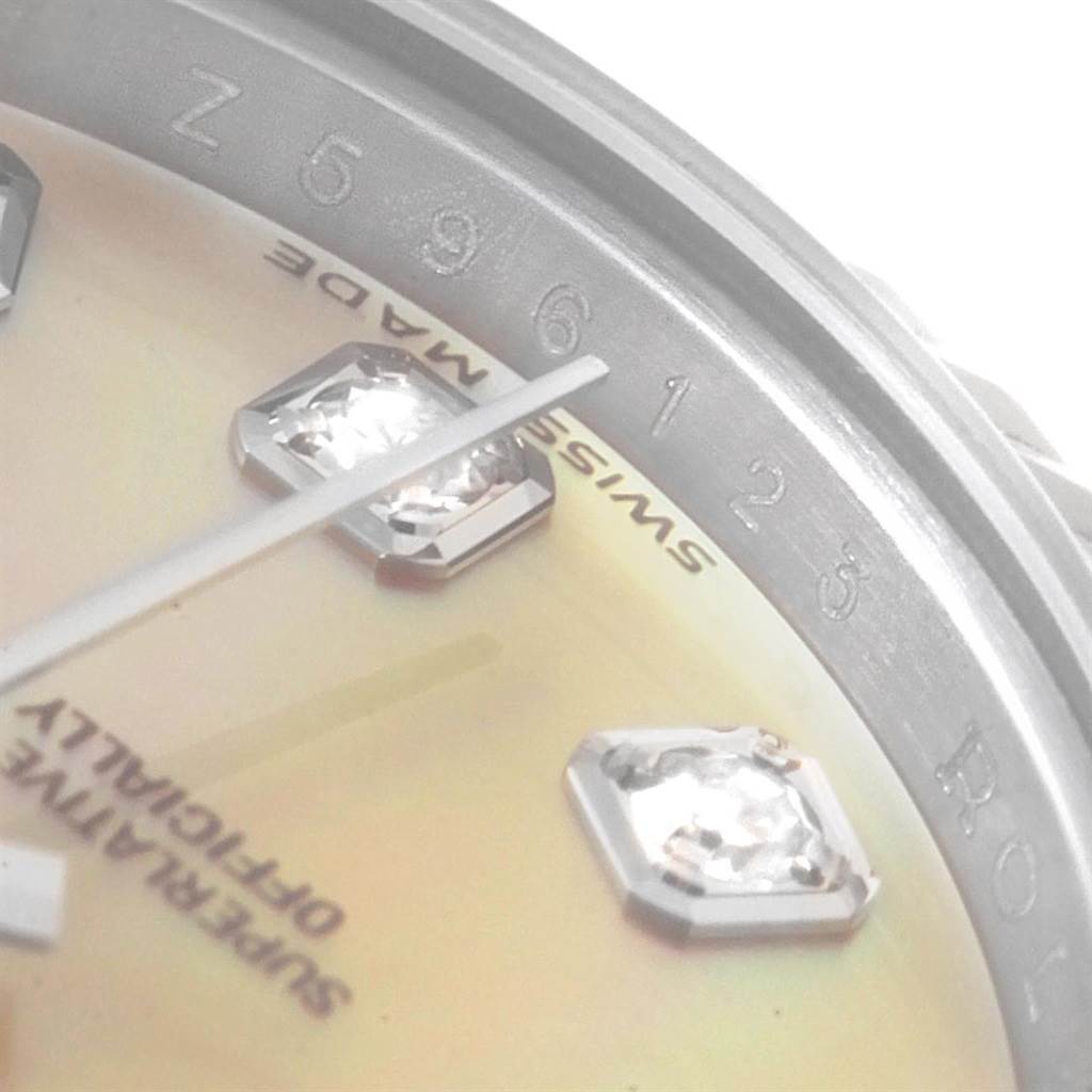 This image shows a close-up of the dial and part of the bezel of a Rolex Datejust 179174 Women
s Stainless Steel Mother of Pearl Dial 179174 Women
s Stainless Steel Mother of Pearl Dial watch.