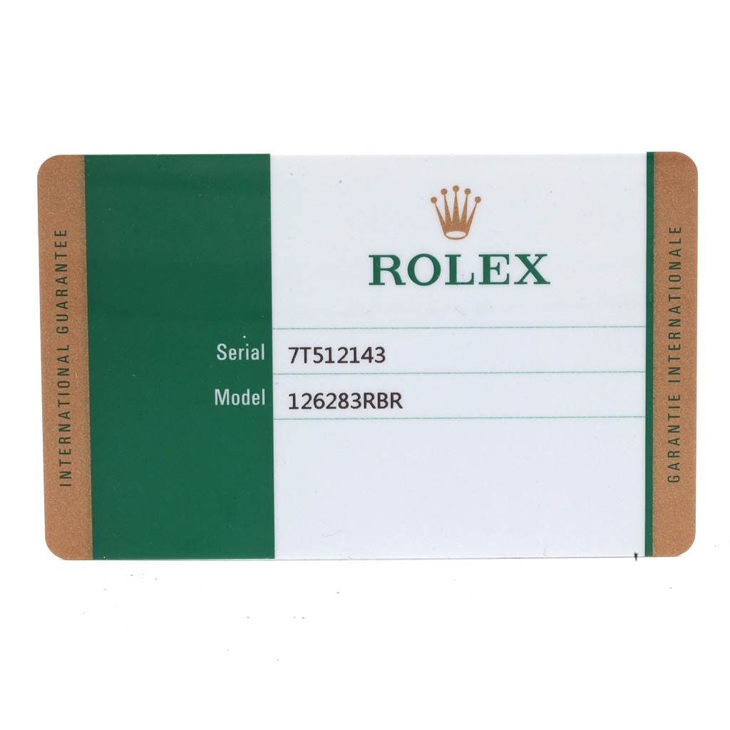 This image shows the warranty card for the Rolex Datejust 126283 Women's Steel and Gold (two tone) Green Dial 126283 Women's Steel and Gold (two tone) Green Dial model 126283RBR.