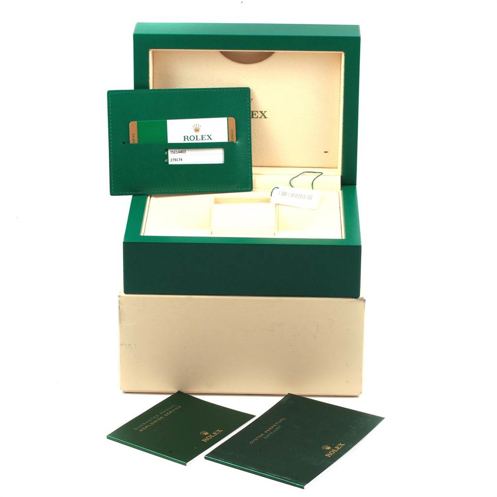 This image shows a Rolex Datejust 7SE14403 Women
s Stainless Steel Grey Dial 7SE14403 Women
s Stainless Steel Grey Dial watch box, warranty card holder, and accompanying booklets from a front-facing angle.