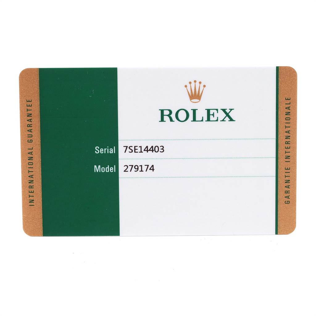 This image shows a Rolex international guarantee card for the Datejust model with serial and model numbers.