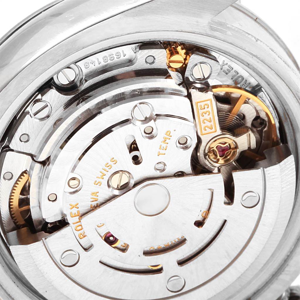 This image shows a close-up of the Rolex Datejust 179174 Women
s Stainless Steel Black Dial 179174 Women
s Stainless Steel Black Dial movement mechanism from the back angle, highlighting intricate components.