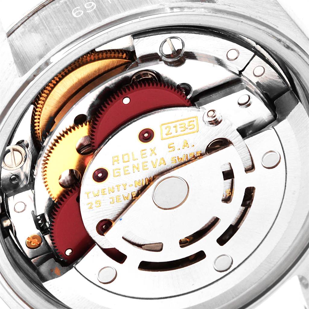 This image shows a close-up view of the internal movement and mechanisms of a Rolex Datejust 69174 Women
s Stainless Steel Silver Dial 69174 Women
s Stainless Steel Silver Dial watch.