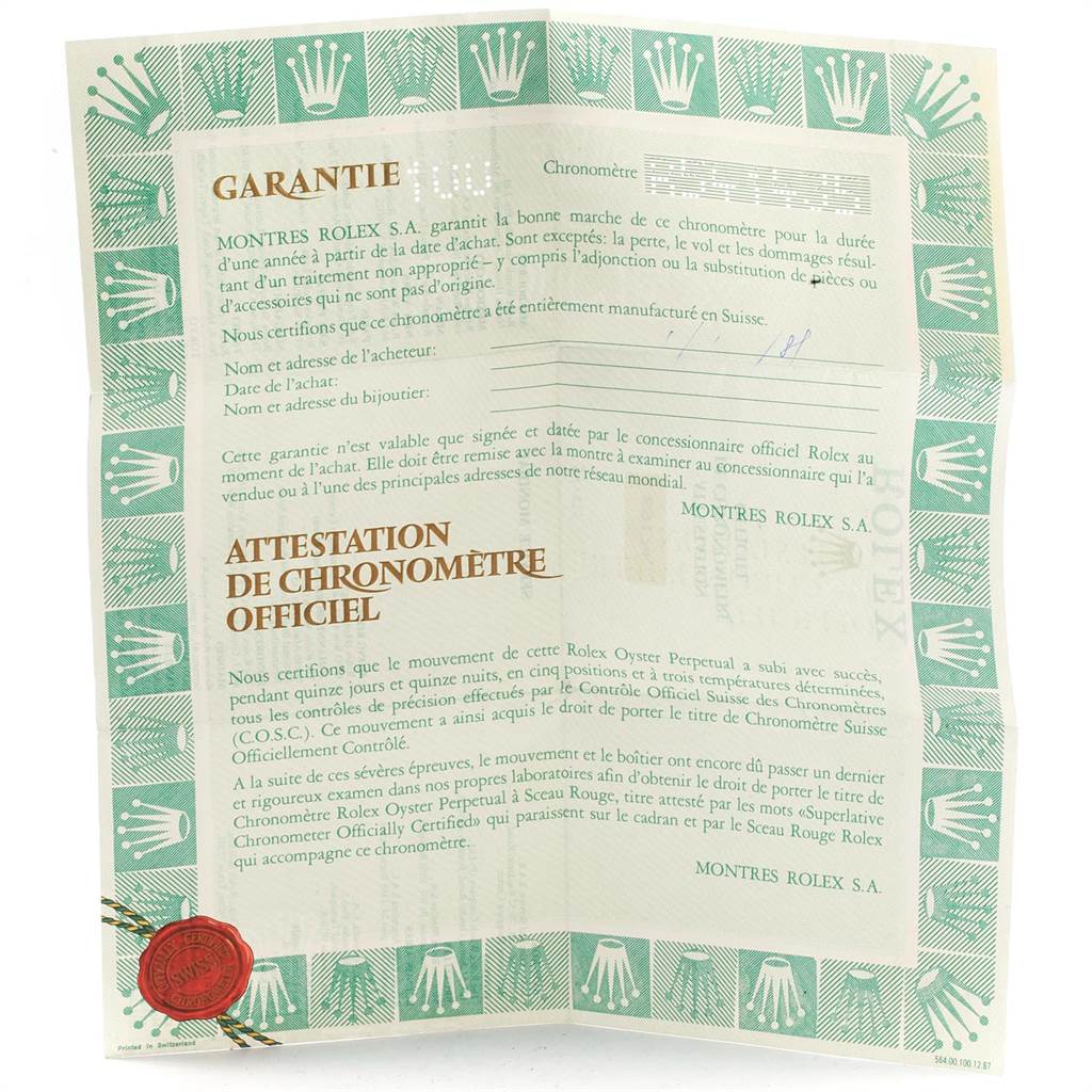 Shown is the warranty card for a Rolex Datejust 69174 Women
s Stainless Steel Silver Dial 69174 Women
s Stainless Steel Silver Dial watch, including various Best Quality
ating details in green and gold.