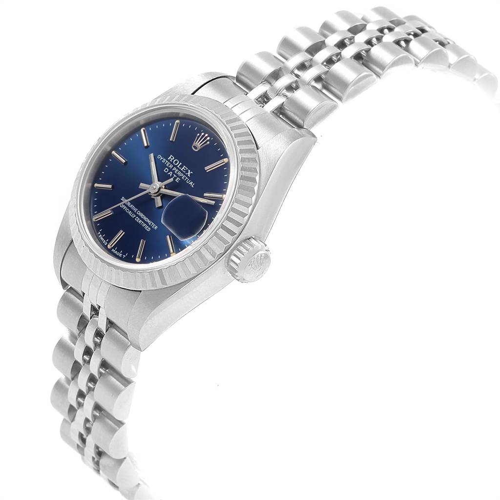 This image shows a side angle of a Rolex Datejust 69174 Women
s Stainless Steel Blue Dial 69174 Women
s Stainless Steel Blue Dial watch, highlighting its blue dial, fluted bezel, and jubilee bracelet.