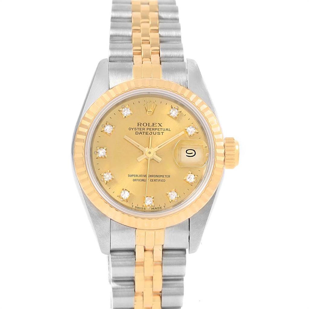 The image shows a Rolex Datejust 69173 Women's Stainless Steel Champagne Dial 69173 Women's Stainless Steel Champagne Dial watch from a top-down angle, highlighting its gold bezel, crown, dial, and two-tone bracelet.