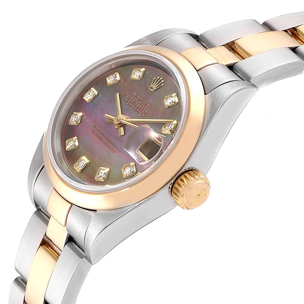 The image shows a side and partial top view of a Rolex Datejust 79163 Women's Steel and Gold (two tone) Mother of Pearl Dial 79163 Women's Steel and Gold (two tone) Mother of Pearl Dial watch, highlighting the dial, crown, and part of the bracelet.