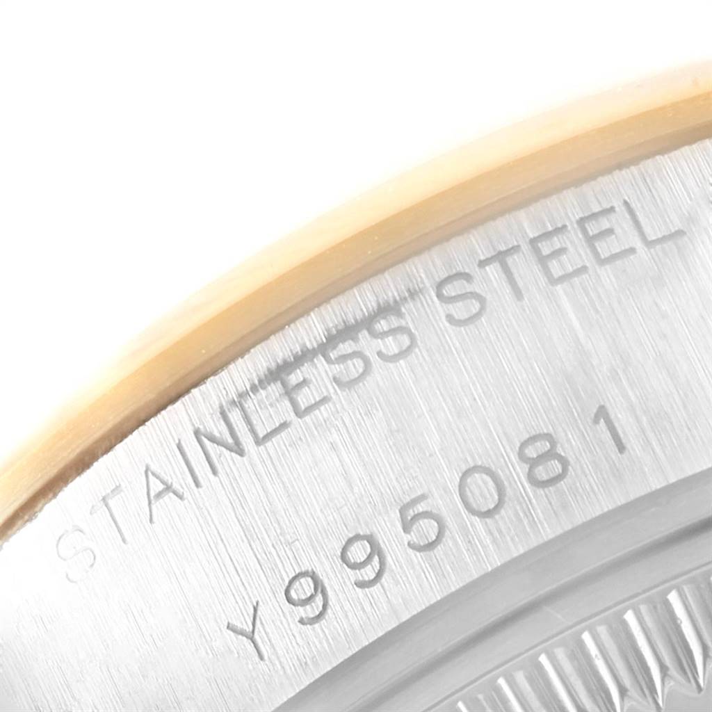 This close-up image shows the stainless steel case back with the serial number of a Rolex Datejust 79163 Women's Steel and Gold (two tone) Mother of Pearl Dial 79163 Women's Steel and Gold (two tone) Mother of Pearl Dial watch.