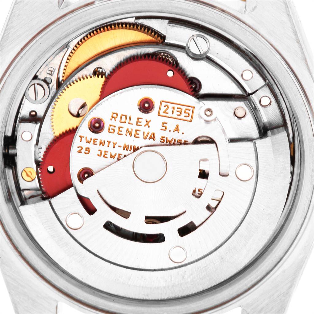 This image shows the back side of the Rolex Datejust 69173 Women's Stainless Steel Champagne Dial 69173 Women's Stainless Steel Champagne Dial watch, focusing on the intricate movement and internal mechanisms.