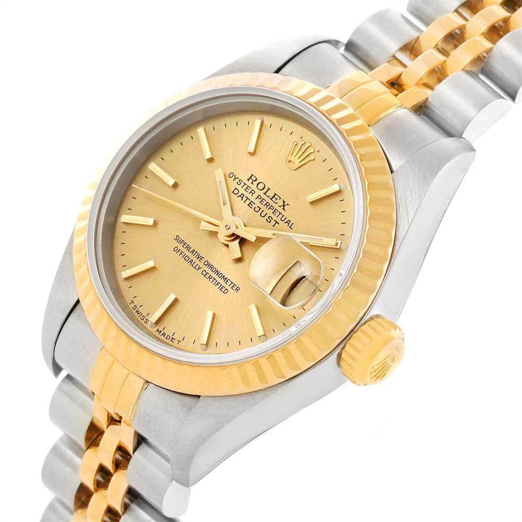 The image shows a close-up angled view of the Rolex Datejust 69173 Women's Stainless Steel Champagne Dial 69173 Women's Stainless Steel Champagne Dial watch, featuring its gold dial, bezel, and two-tone bracelet.