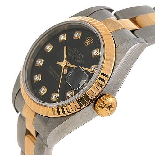 The image shows a side angle of the Rolex Datejust 79173 Women's Stainless Steel Black Dial 79173 Women's Stainless Steel Black Dial, highlighting its bezel, crown, and part of the bracelet.