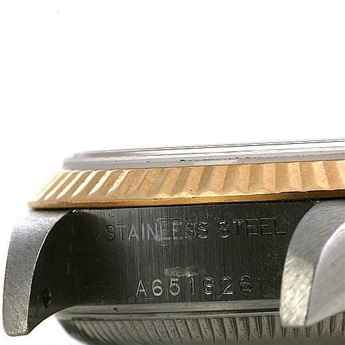 This image shows a close-up side view of the Rolex Datejust 79173 Women's Stainless Steel Black Dial 79173 Women's Stainless Steel Black Dial watch case, highlighting the stainless steel marking and the model number.