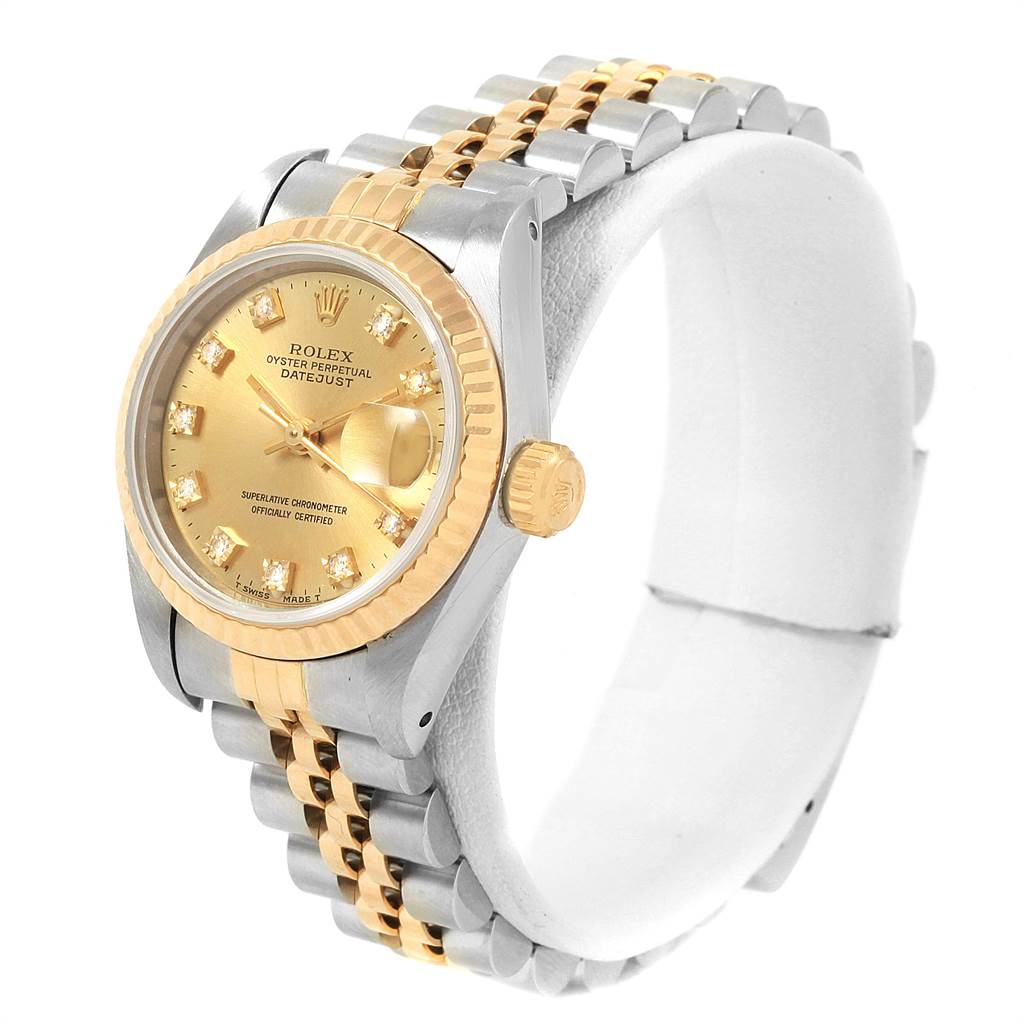 The Rolex Datejust 69173 Women's Stainless Steel Champagne Dial 69173 Women's Stainless Steel Champagne Dial watch is shown at a three-quarter angle, highlighting the face, bezel, crown, and two-tone bracelet.