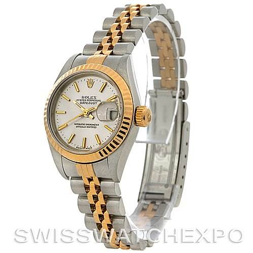 The image shows a Rolex Datejust 79173 Women
s Stainless Steel Silver Dial 79173 Women
s Stainless Steel Silver Dial watch at a slightly tilted side angle, displaying the face, bezel, crown, and two-tone bracelet.