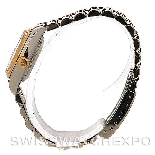 The image shows a side view of a Rolex Datejust 79173 Women
s Stainless Steel Silver Dial 79173 Women
s Stainless Steel Silver Dial watch, highlighting the crown and part of the bracelet.