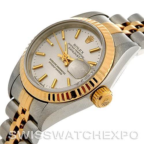 This image features a side and partial top view of the Rolex Datejust 79173 Women
s Stainless Steel Silver Dial 79173 Women
s Stainless Steel Silver Dial watch, showcasing its bezel, crown, and bracelet.
