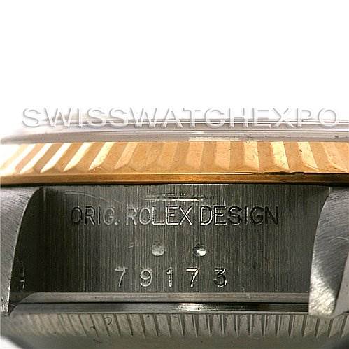 The image shows a close-up view of the side case of a Rolex Datejust 79173 Women
s Stainless Steel Silver Dial 79173 Women
s Stainless Steel Silver Dial watch, highlighting the "Orig. Rolex Design" engraving and model number 79173.