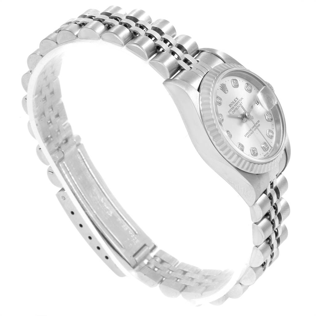 This image shows a Rolex Datejust 69174 Women
s Stainless Steel Silver Dial 69174 Women
s Stainless Steel Silver Dial watch from a side angle, highlighting its face, bezel, and metal bracelet.