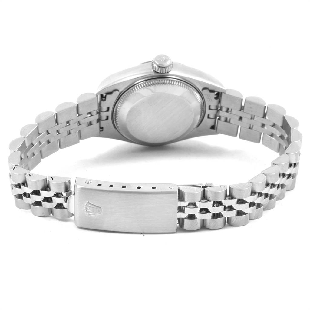 The image shows the back view of a Rolex Datejust 69174 Women
s Stainless Steel Silver Dial 69174 Women
s Stainless Steel Silver Dial watch, highlighting the bracelet clasp and watch case back.